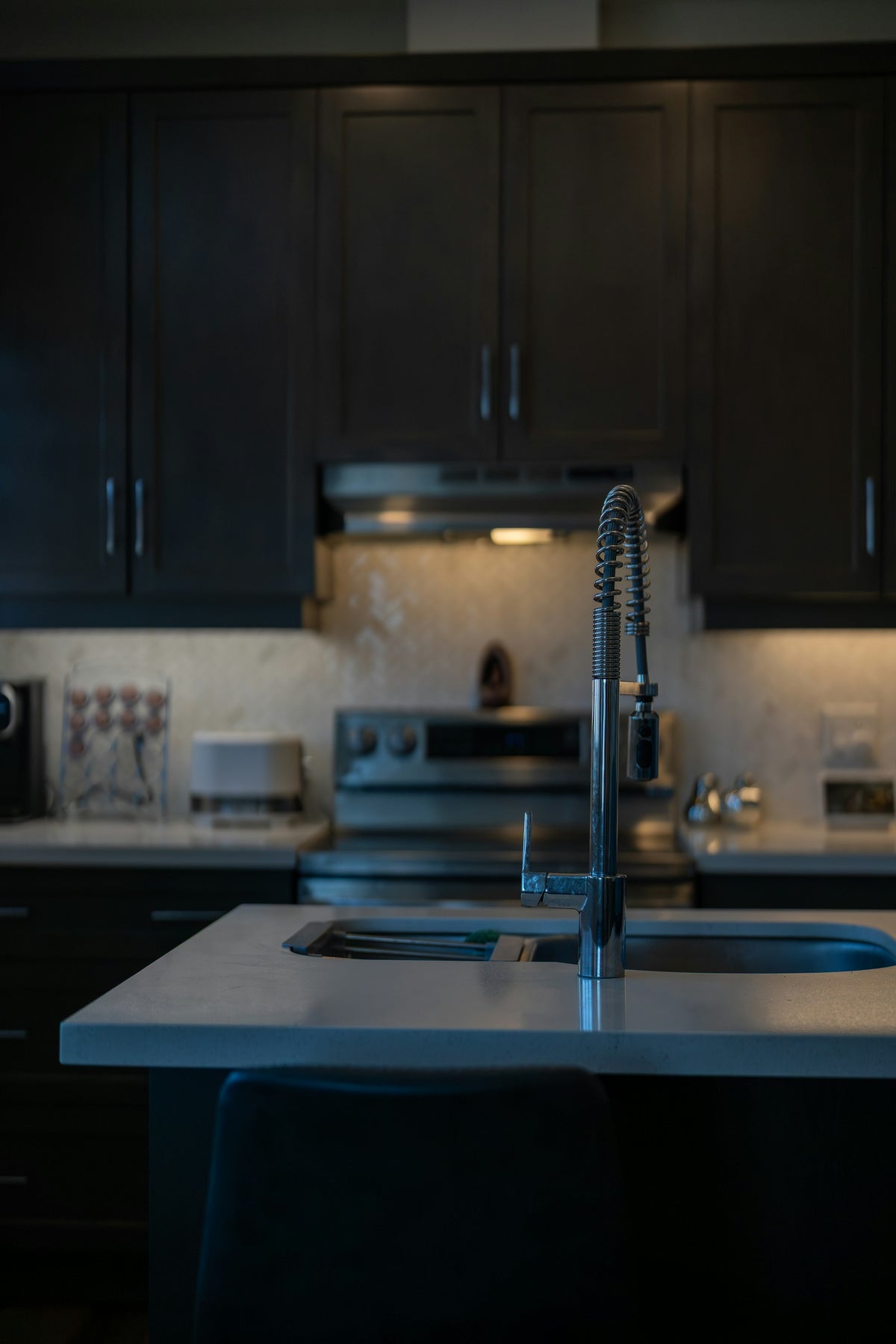 Modern kitchen island with sink and faucet, home and kitchen organizers